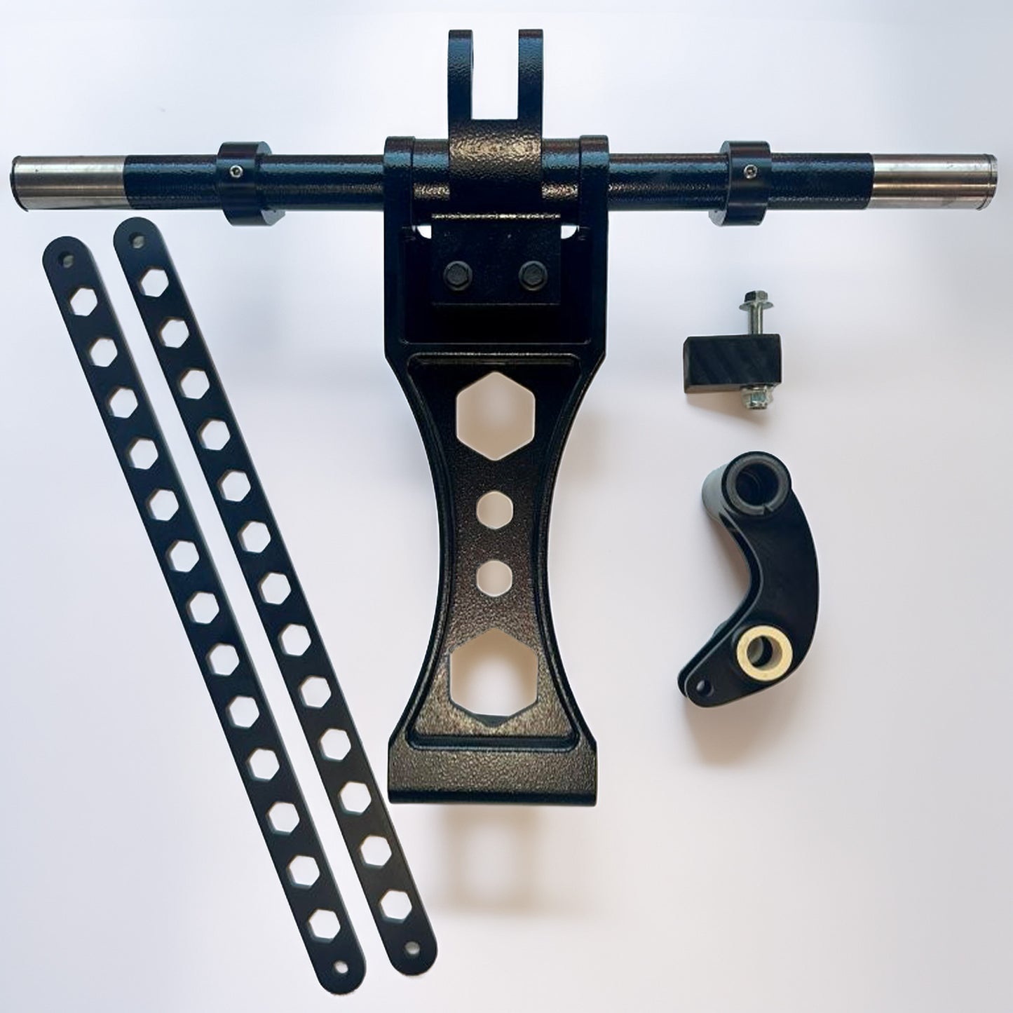 A black metal mounting hardware kit laid out on a white background, including a central bracket with a horizontal rod, two long slotted metal bars, a small square mounting piece, and a curved bracket with a brass pin.